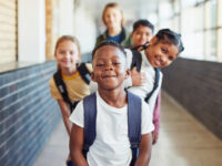 Group of kids in school hallway