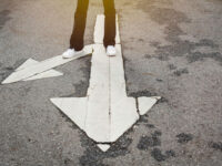 crossroads arrow in roadway