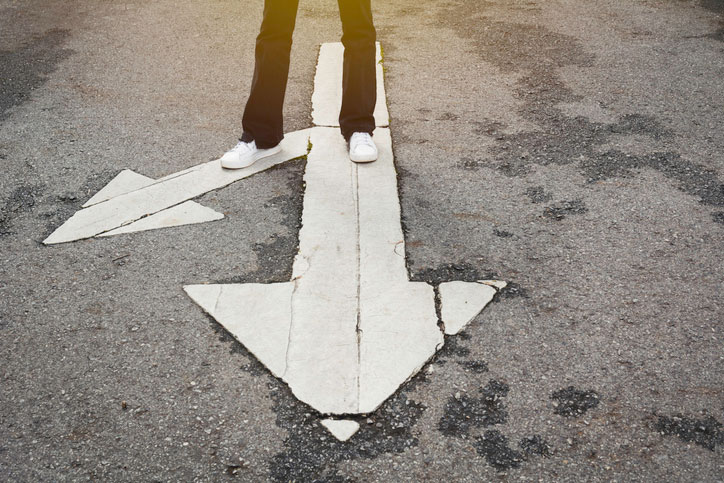 crossroads arrow in roadway