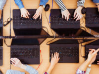 girls in computer lab coding